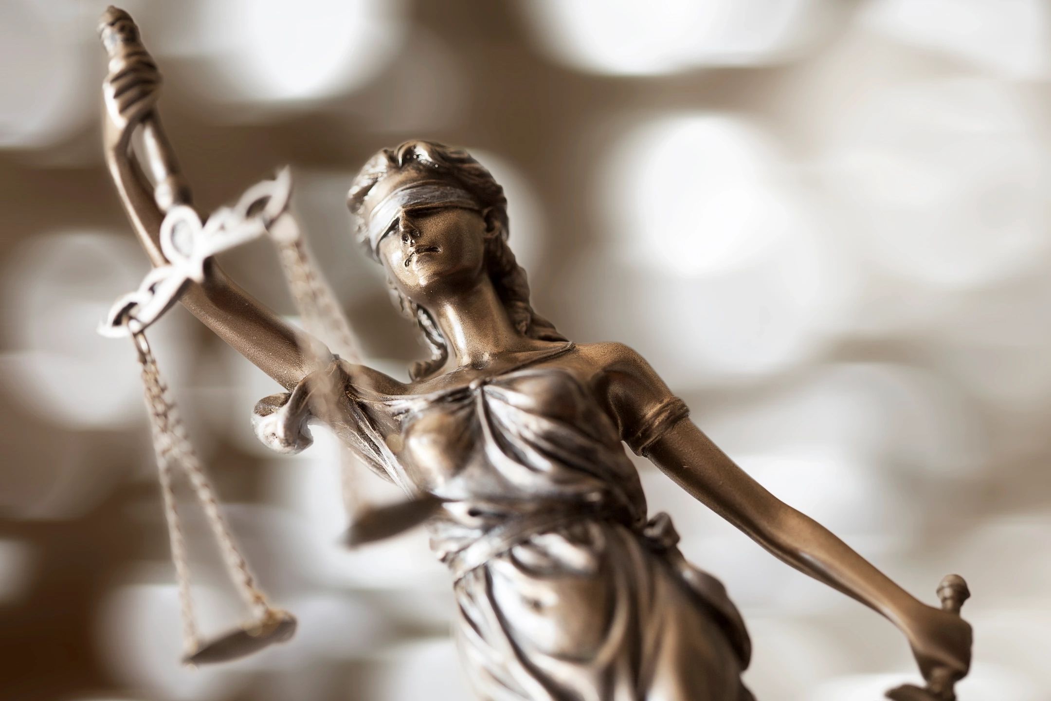 Lady Justice holding scale