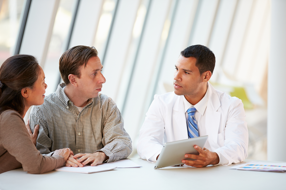 Doctor speaking to patient